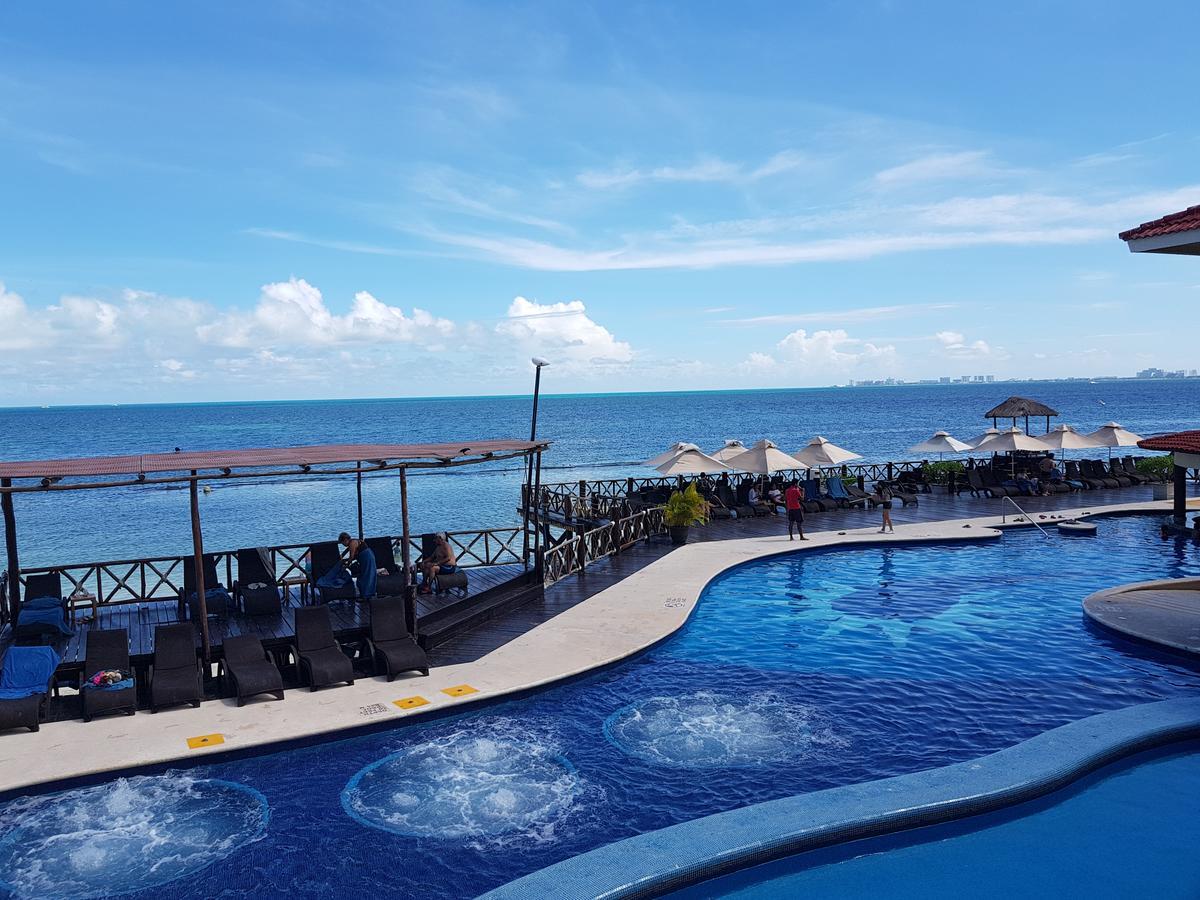 Suite frente al Mar Cancún Exterior foto
